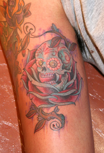 http://www.tattoodesignshop.com/images/skull-rose-tattoo22.jpg